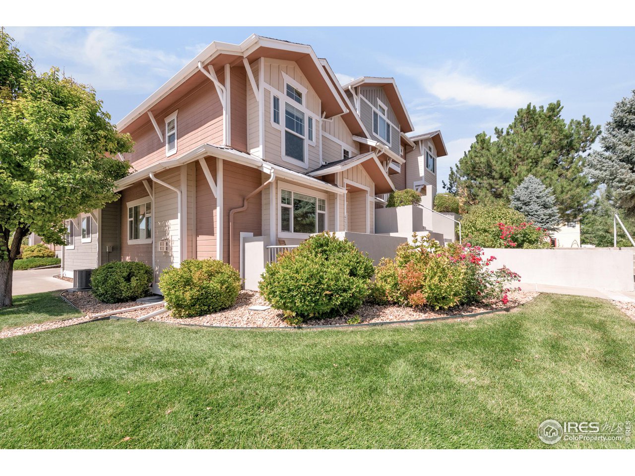 4232 Riley Drive Longmont, CO 80503 - Photo 32 of 35 a front view of a house with a yard