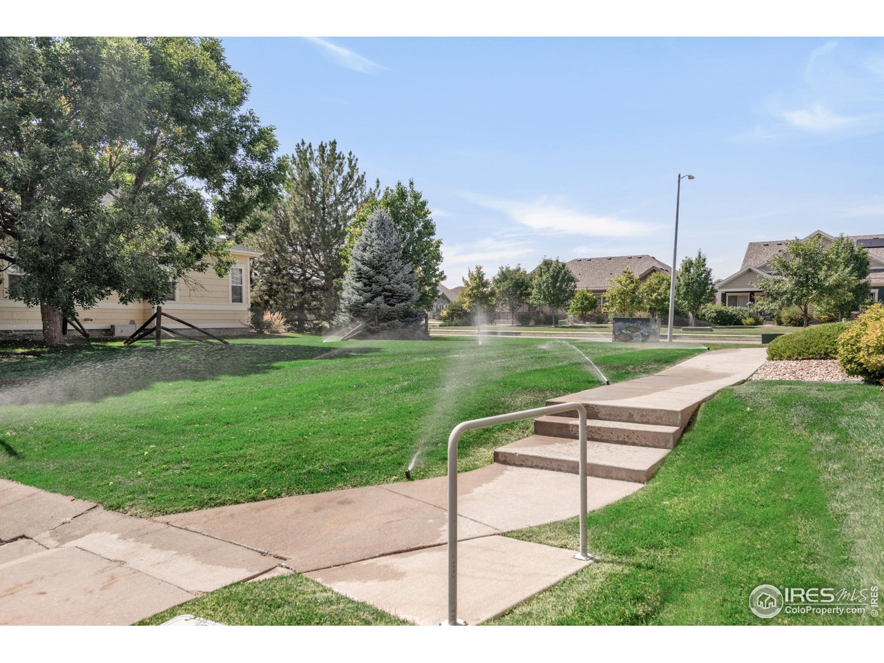 4232 Riley Drive Longmont, CO 80503 - Photo 35 of 35 a view of a park with bench