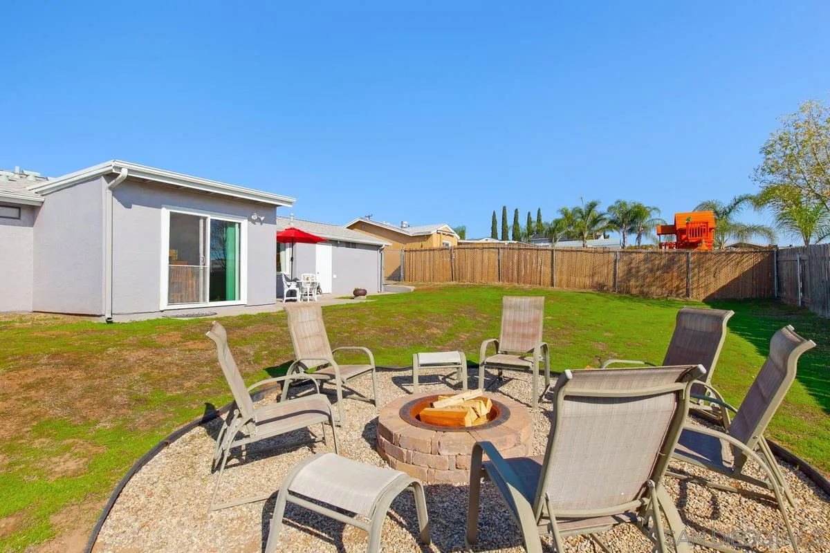 9433 Doheny Road Santee, CA 92071 - Photo 28 of 31 a view of a patio with chairs and table