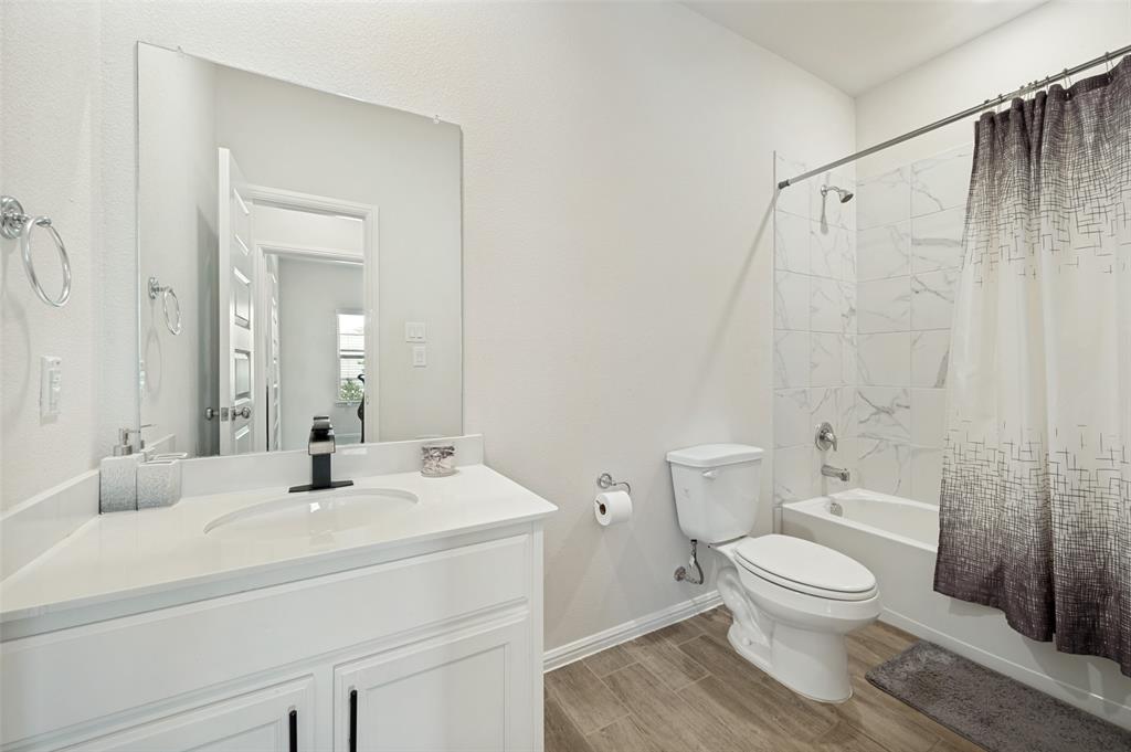 14065 Ilderton Street Pilot Point, TX 76258 - Photo 16 of 19 First floor bathroom
