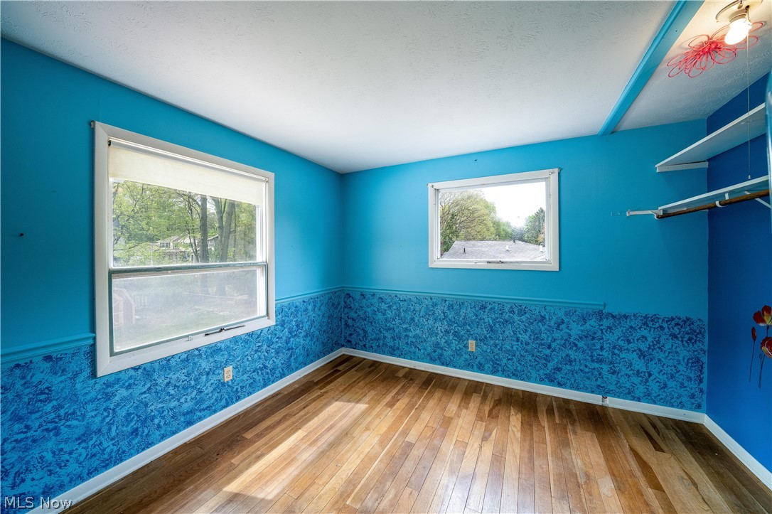 3754 Vira Road Stow, OH 44224 - Photo 26 of 35 3754 Vira Rd, Stow, OH 44224 won't last long! 4 Bedrooms & full bath on the 2nd floor as well as half bath on the 1st floor, separate Living Room, Family Room with beautiful Fireplace, gorgeous Sunroom with sliding doors to the huge deck with fenced rear yard & tool shed, Kitchen & Dining Room with wood floors; Full basement with half finished for recreation Room & other half as workshop & Hobby area as well as Laundry Hookups & Utilities.