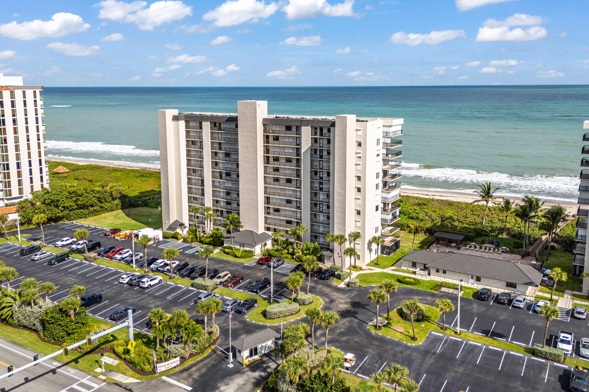 4250 North Hwy A1A, Unit 1007 Fort Pierce, FL 34949 - Photo 2 of 24 a view of swimming pool with outdoor seating and plants