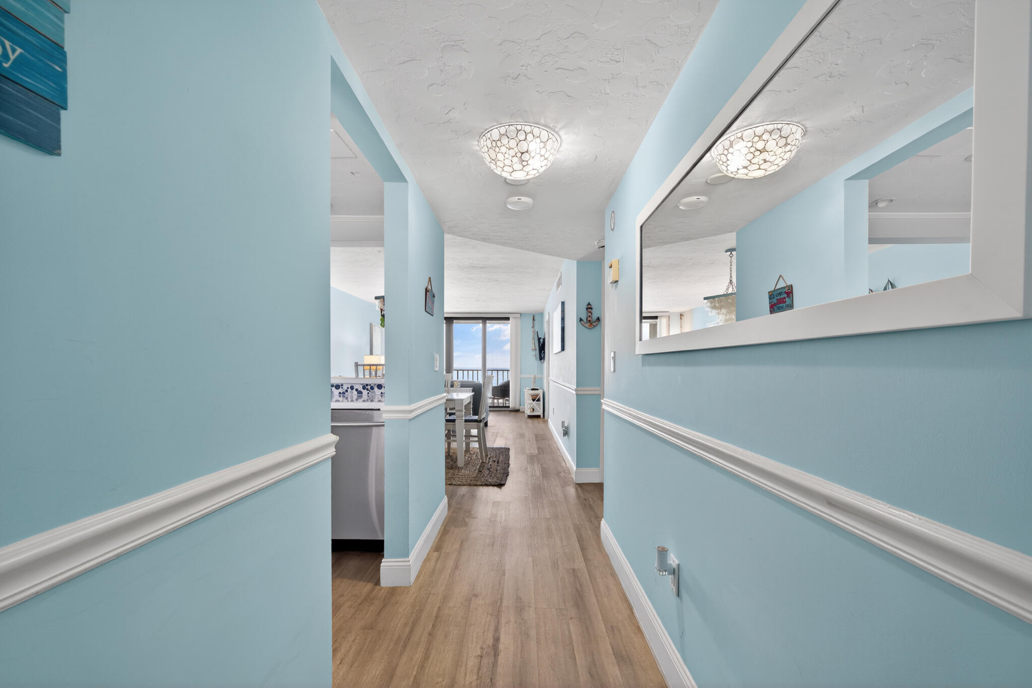4250 North Hwy A1A, Unit 1007 Fort Pierce, FL 34949 - Photo 5 of 24 a kitchen with a refrigerator and a stove