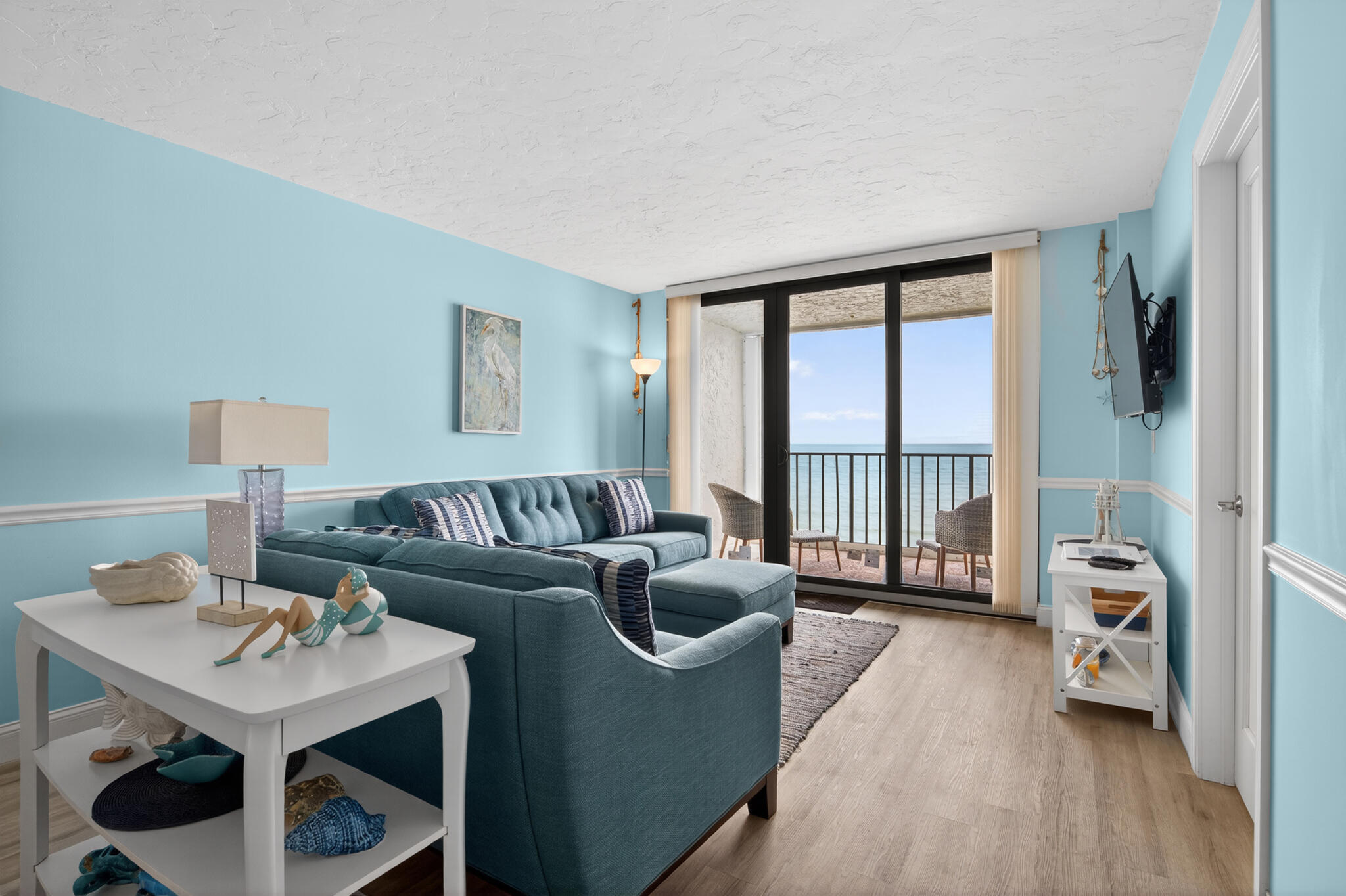 4250 North Hwy A1A, Unit 1007 Fort Pierce, FL 34949 - Photo 10 of 24 a living room with furniture and a window