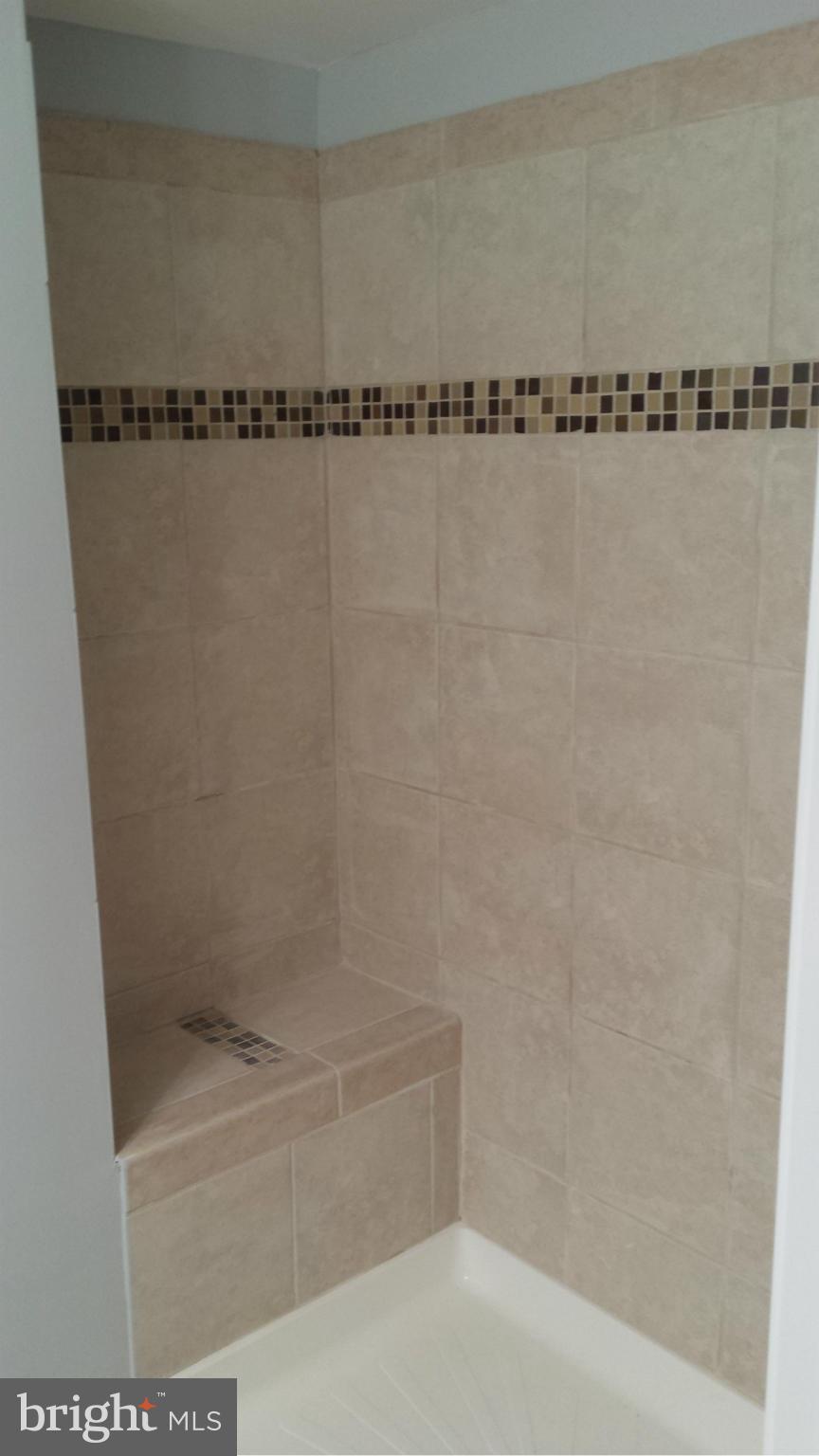 1111 Wicklow Road Baltimore, MD 21229 - Photo 13 of 15 a bathroom with a shower