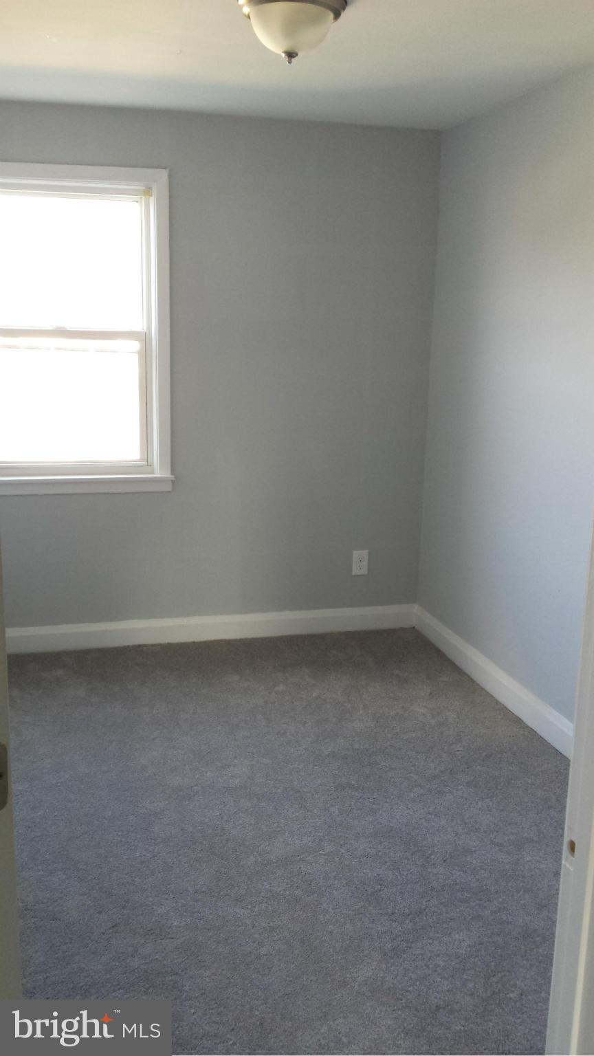 1111 Wicklow Road Baltimore, MD 21229 - Photo 9 of 15 a view of a window in an empty room