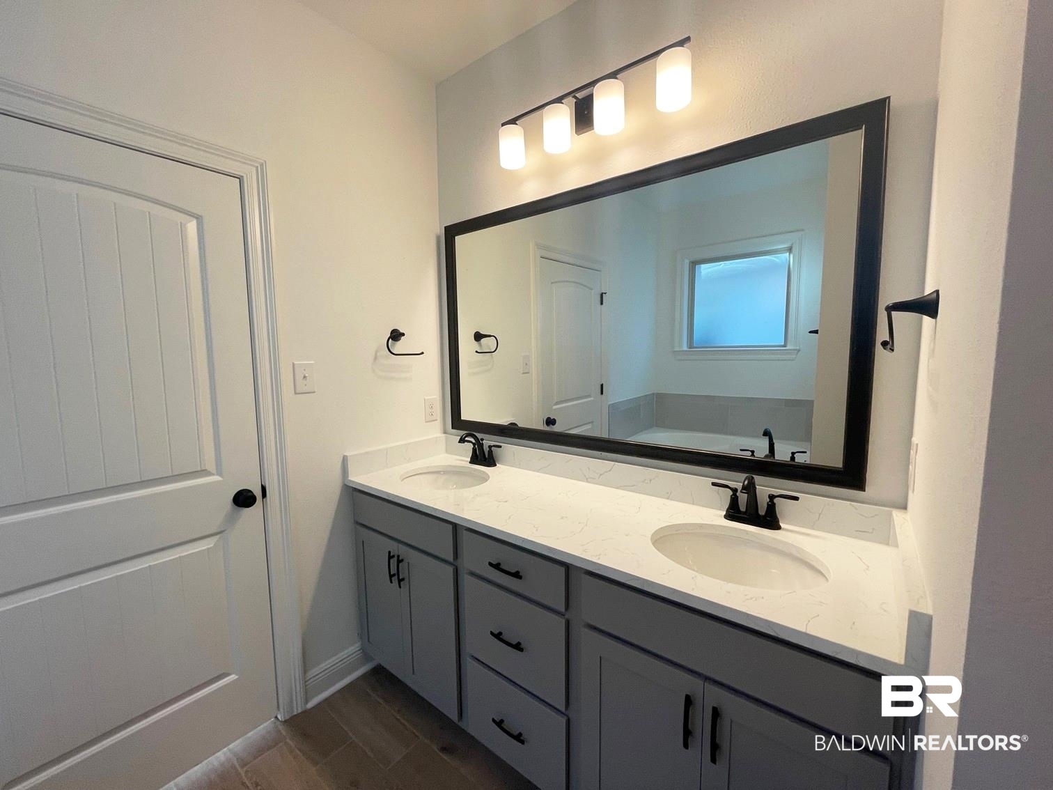 1403 Fenton Circle Foley, AL 36535 - Photo 7 of 15 Bathroom featuring vanity and a bathing tub