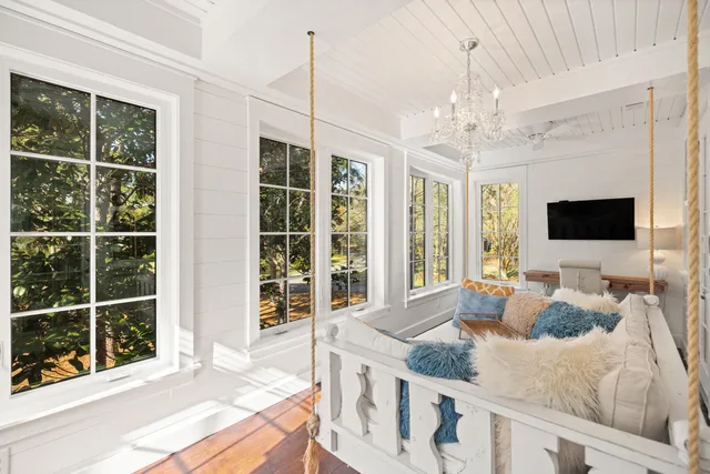 a room with furniture and wooden floor