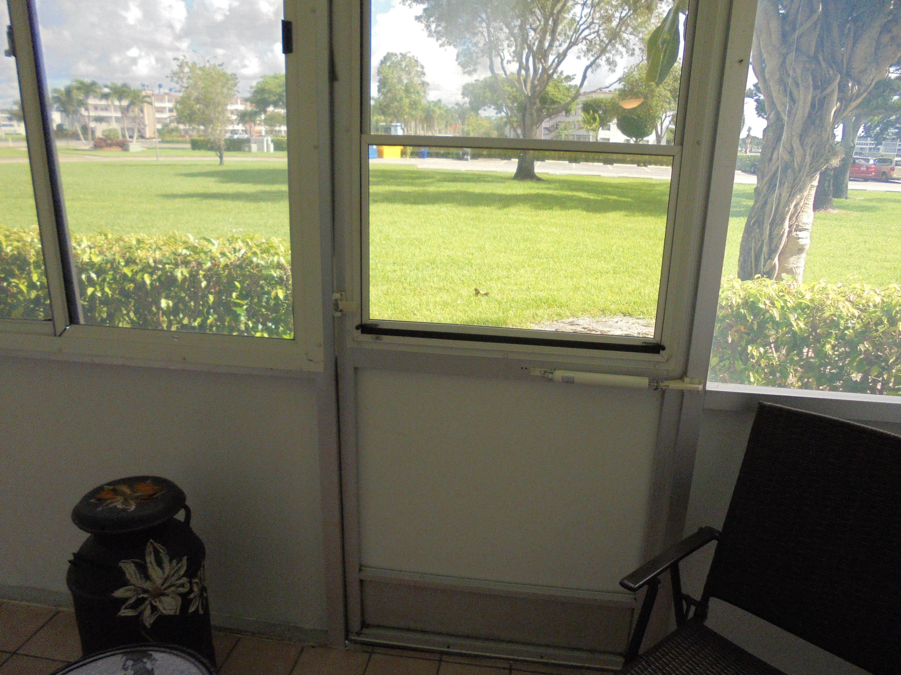 3 Dorset A Boca Raton, FL 33434 - Photo 1 of 18 a view of a room that has a large window