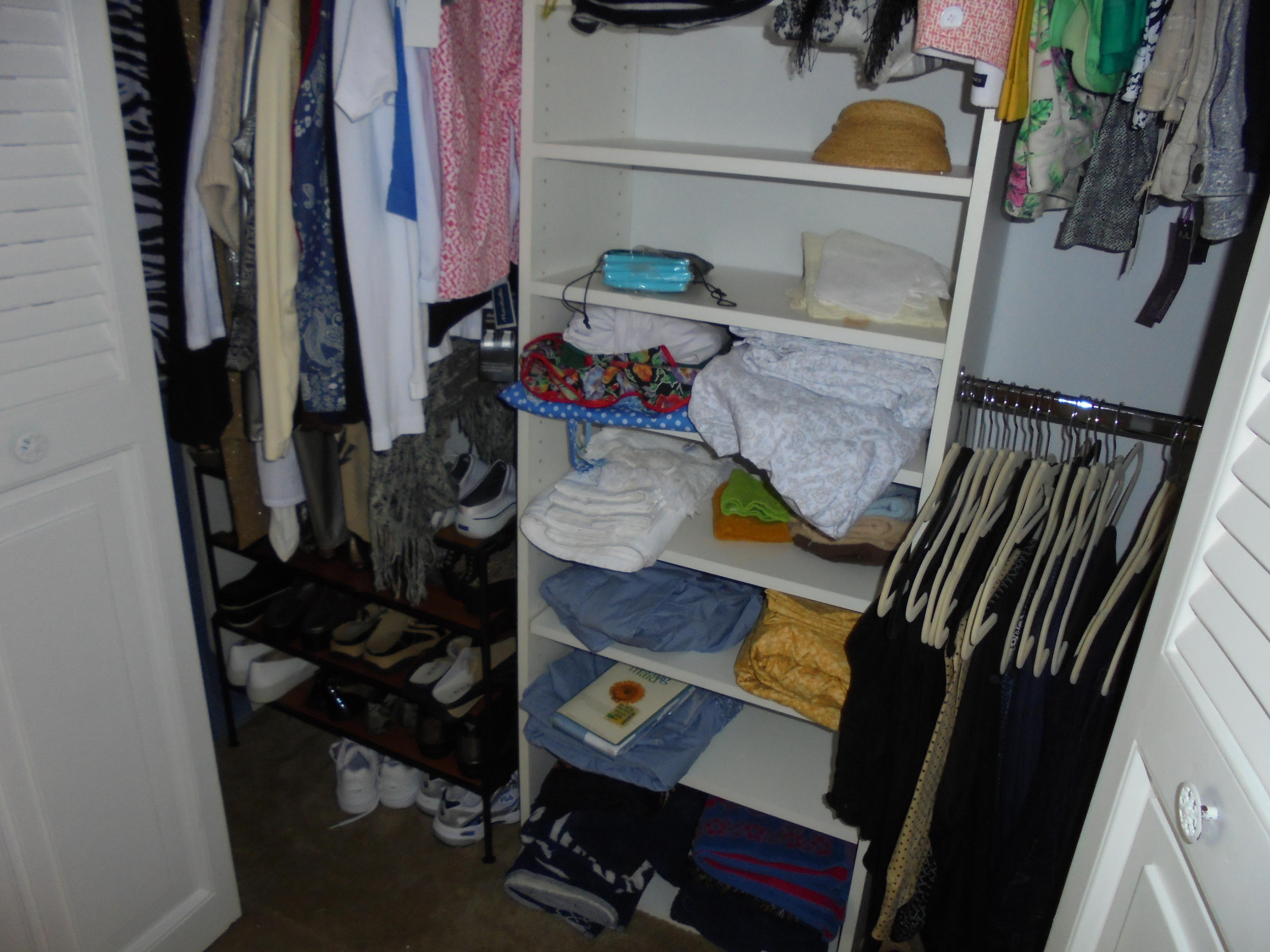 3 Dorset A Boca Raton, FL 33434 - Photo 12 of 18 a view of walk in closet with clothes and shoes