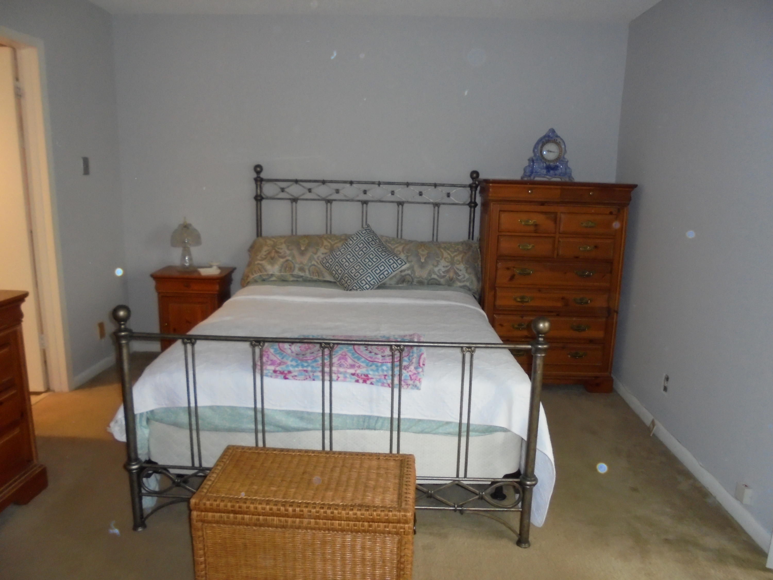 3 Dorset A Boca Raton, FL 33434 - Photo 13 of 18 a bedroom with furniture and a window
