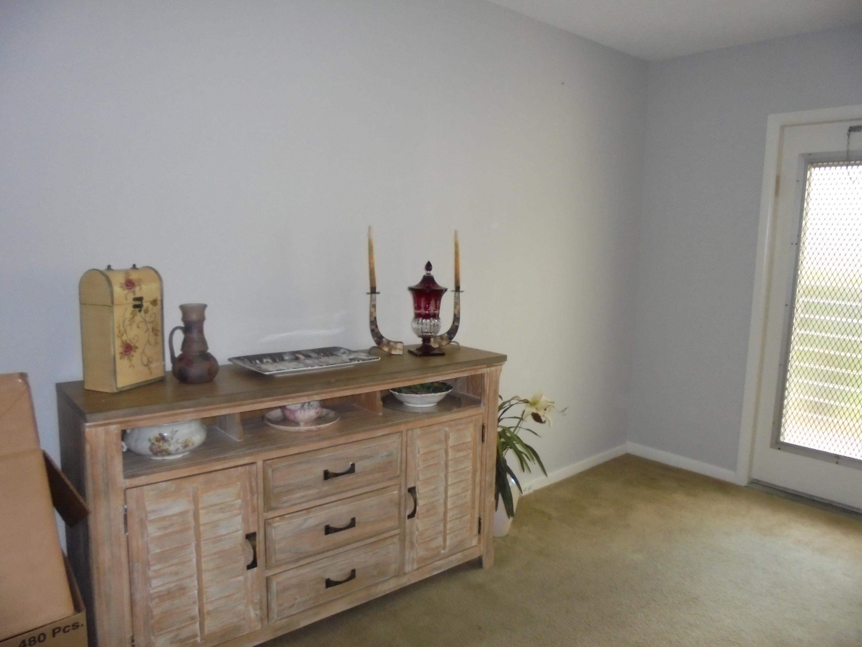 3 Dorset A Boca Raton, FL 33434 - Photo 5 of 18 a room with storage and utility
