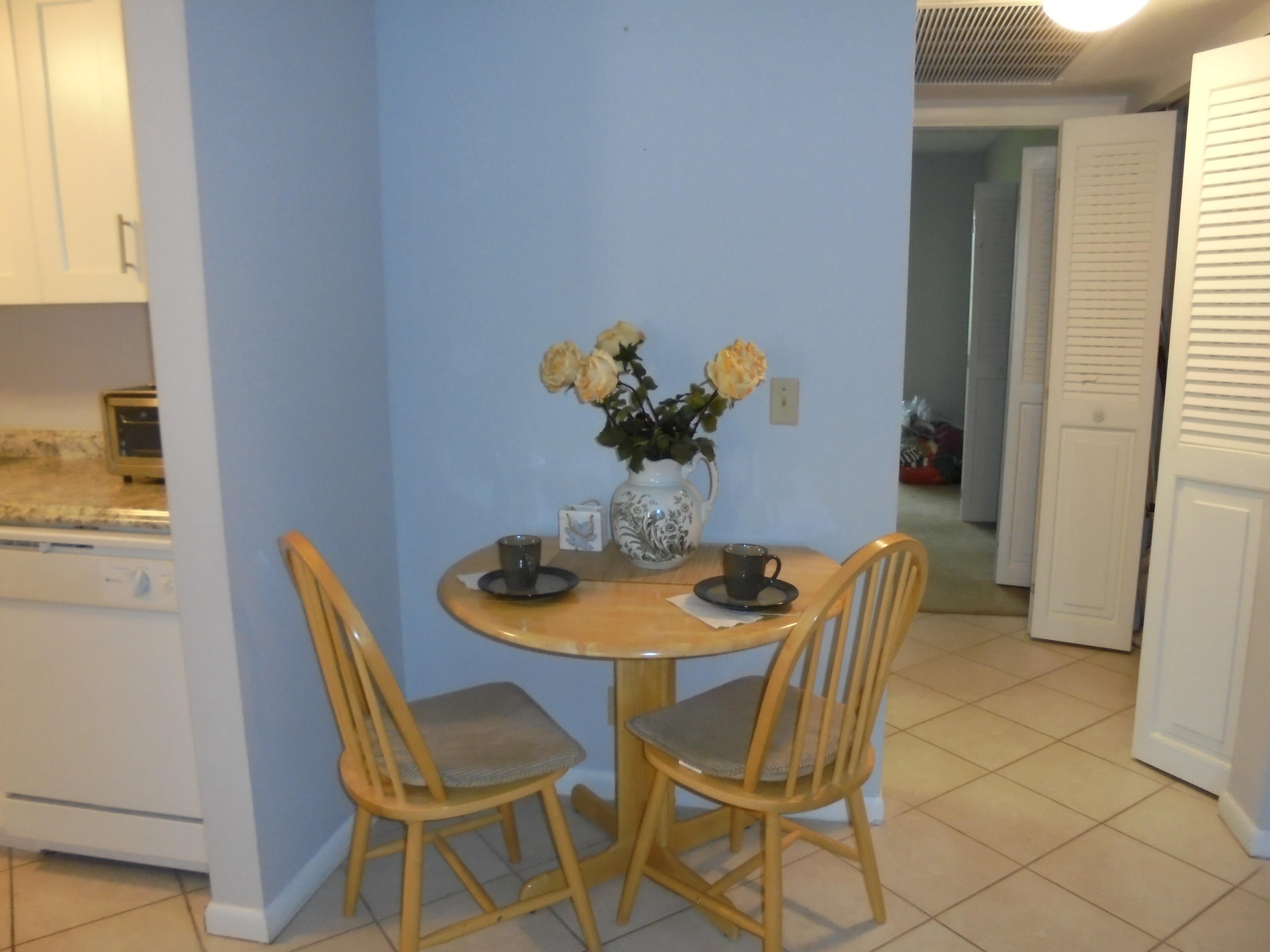 3 Dorset A Boca Raton, FL 33434 - Photo 9 of 18 a dining room with furniture and a window