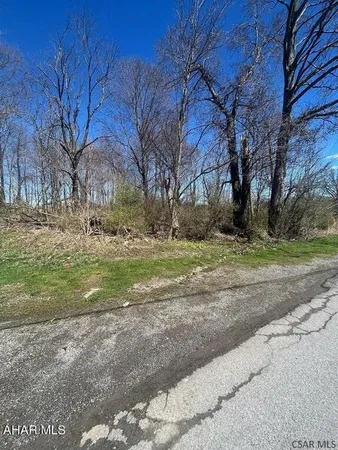 a view of a house with a big yard
