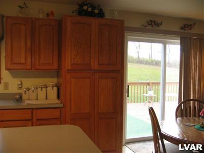 0 Rr Kunkletown, PA 18058 - Photo 7 of 12 Sliding glass doors to the deck in the back yard make entertaining a snap!