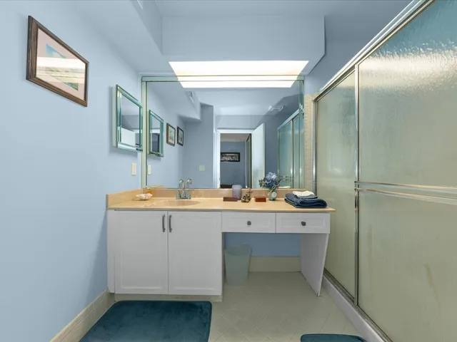 a view with cabinets a sink and dishwasher in it