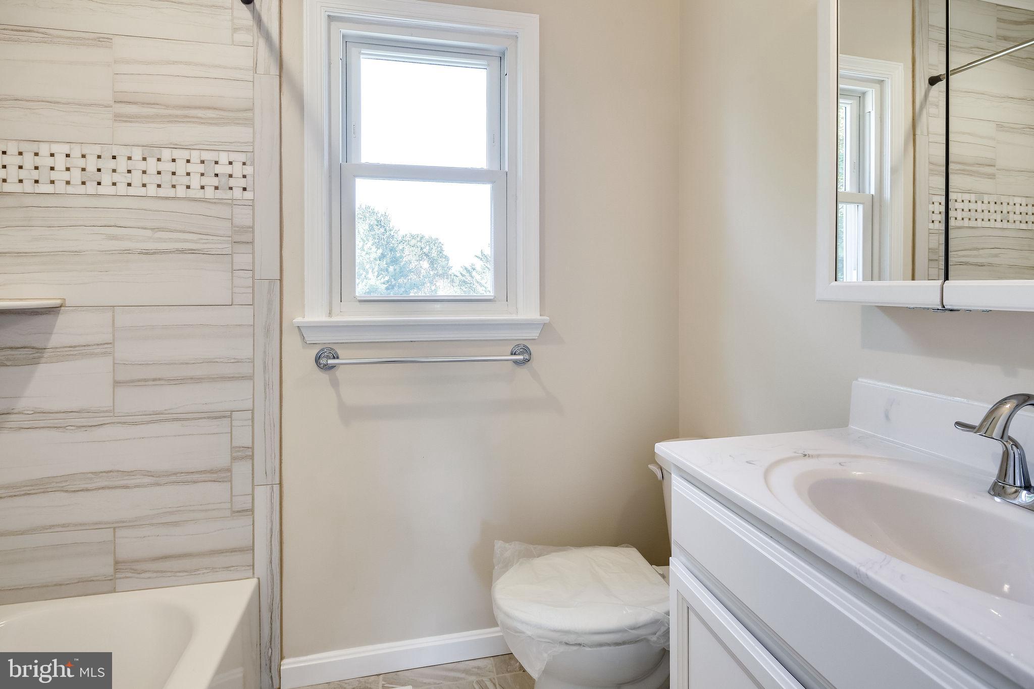 194 Bell Road Westminster, MD 21158 - Photo 25 of 33 Hall Bath with Custom Tile Tub/Shower