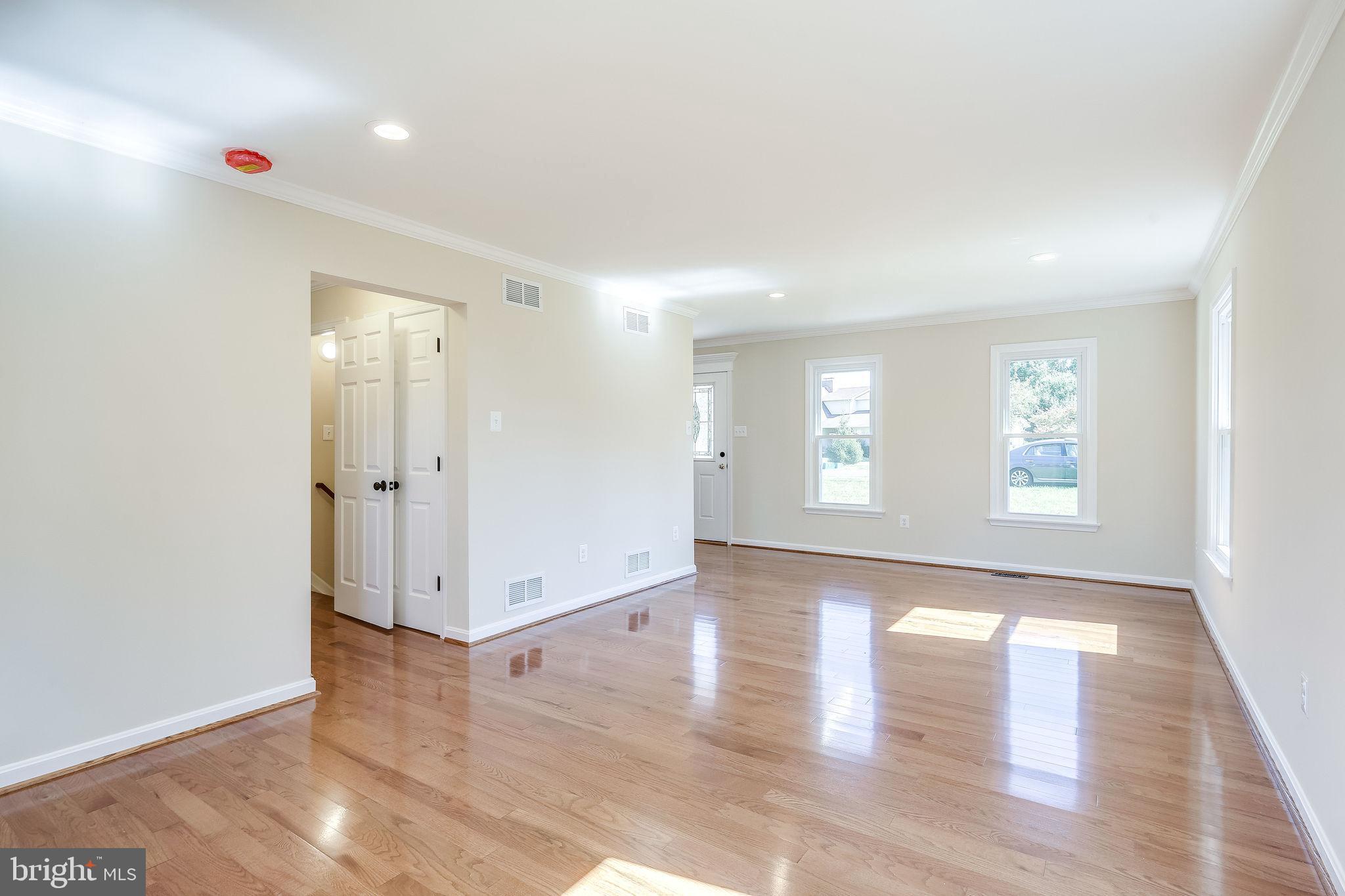 Family Room with Hardwood & Recessed Lighting