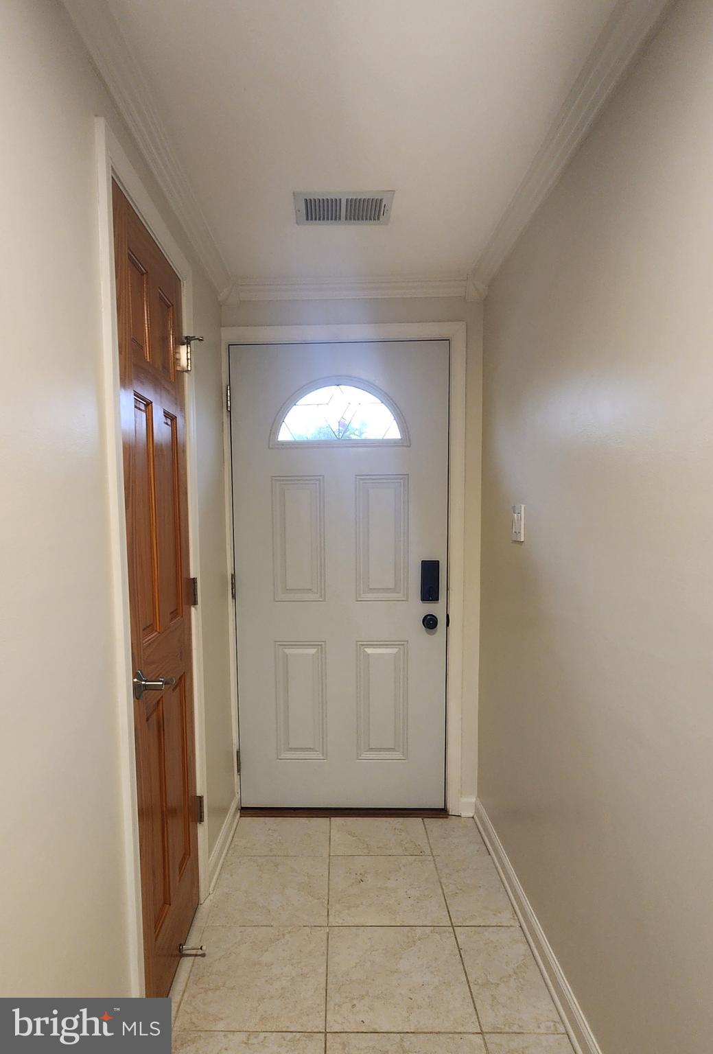 9533 Quarry Bridge Court Columbia, MD 21046 - Photo 3 of 17 a view of a hallway with a elevator