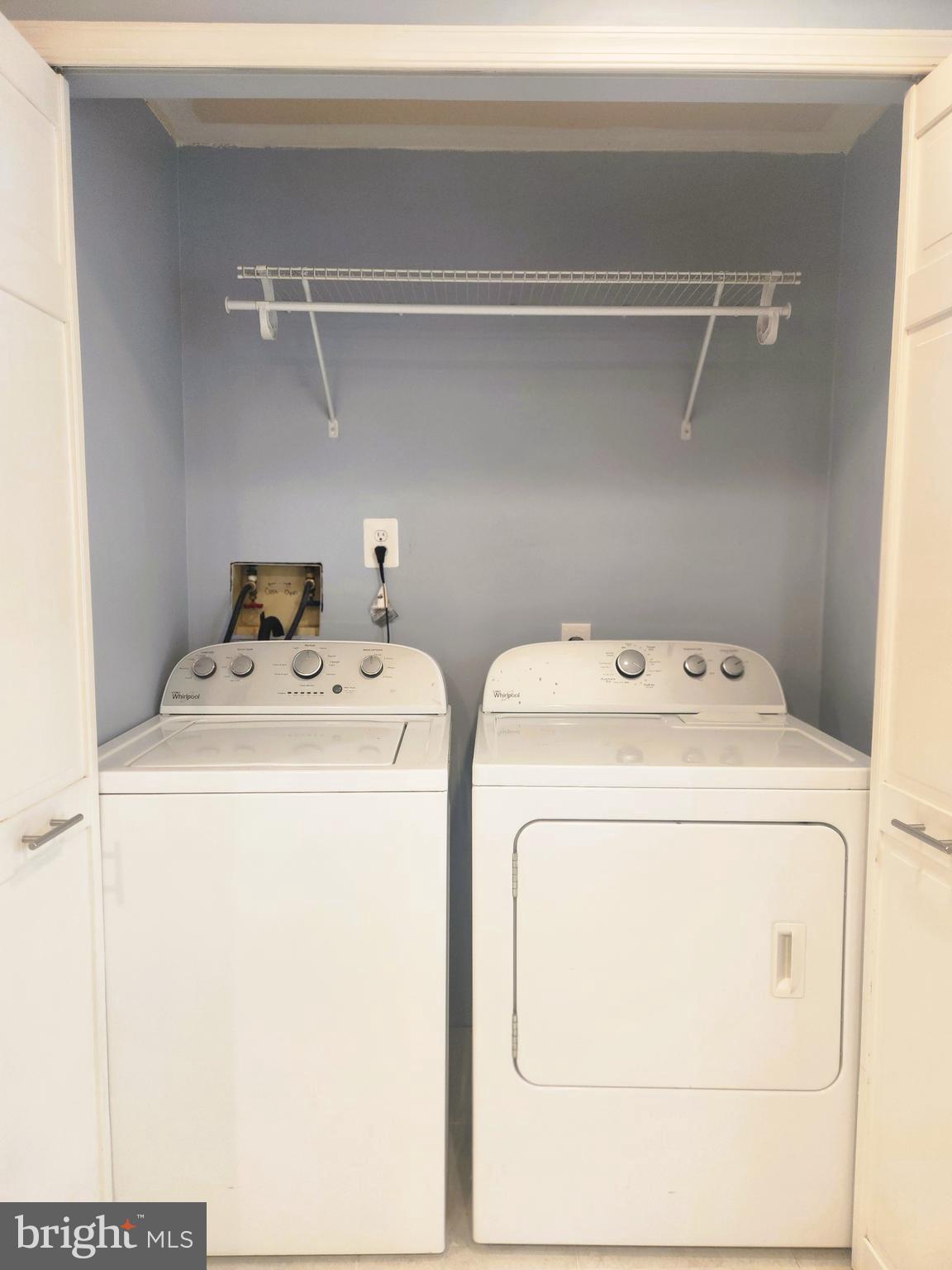 9533 Quarry Bridge Court Columbia, MD 21046 - Photo 8 of 17 a utility room with dryer and washer