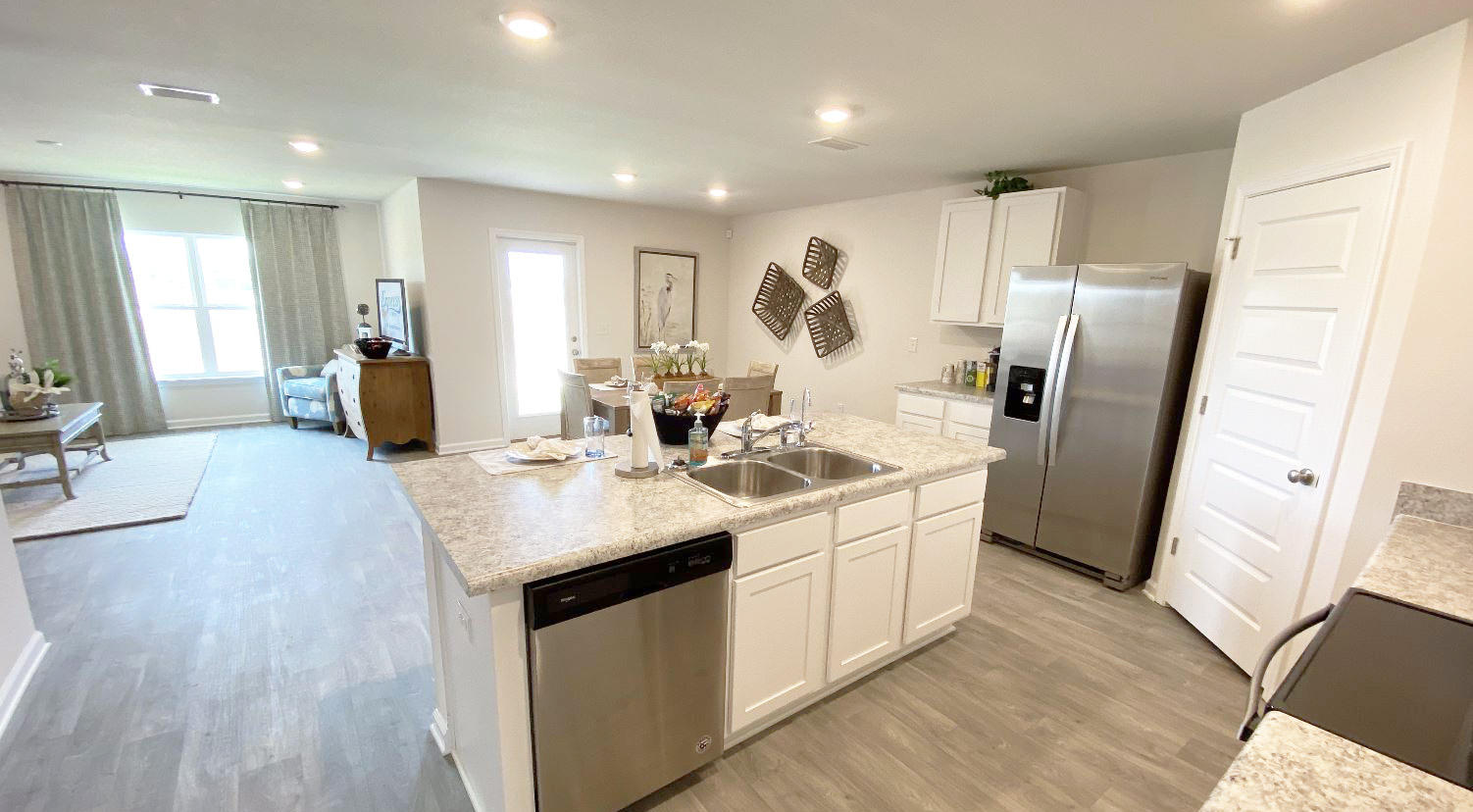 973 Indian Woman Road Santa Rosa Beach, FL 32459 - Photo 12 of 23 a kitchen with stainless steel appliances granite countertop a sink stove and refrigerator