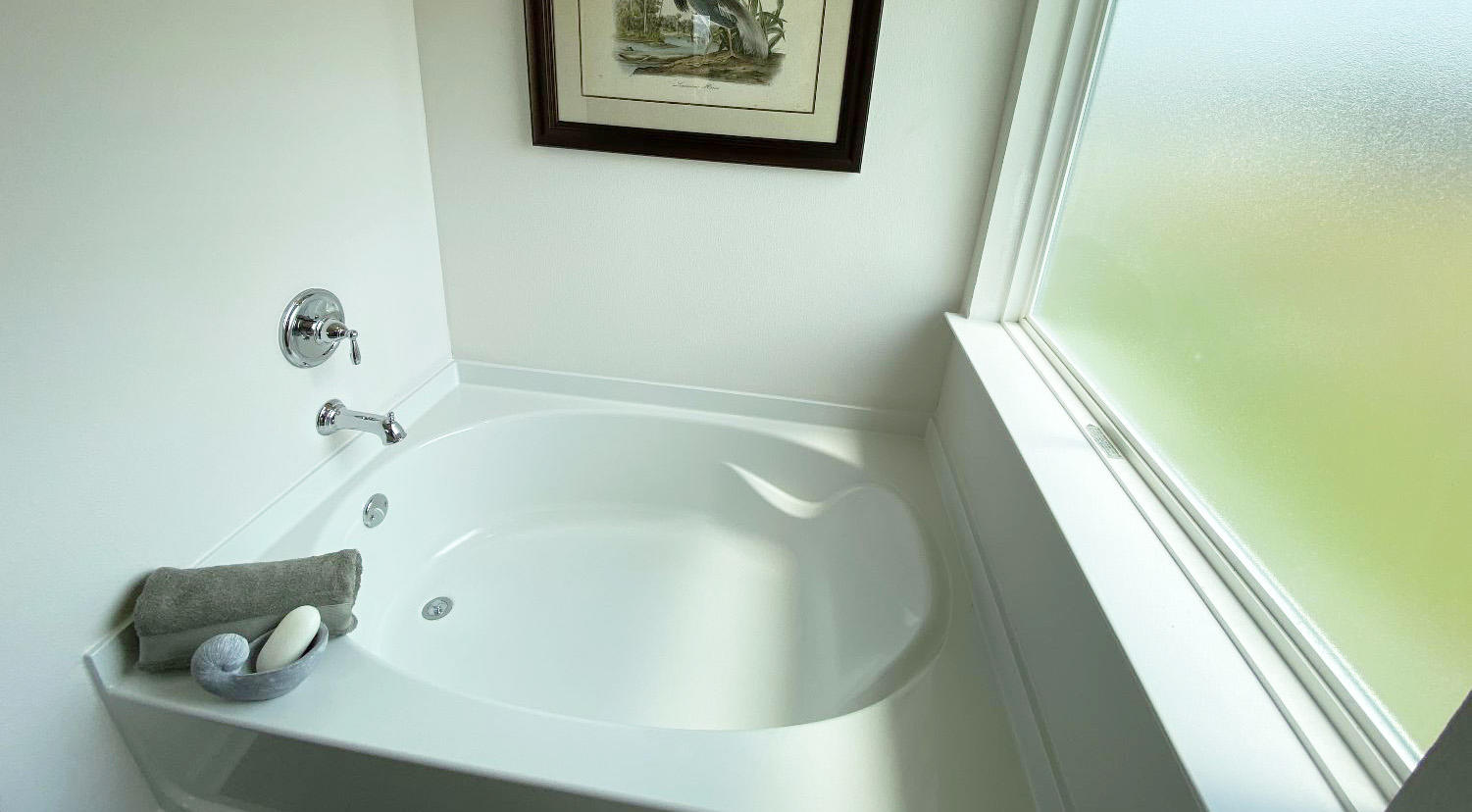 973 Indian Woman Road Santa Rosa Beach, FL 32459 - Photo 20 of 23 a bath tub sitting in a bathroom next to a window