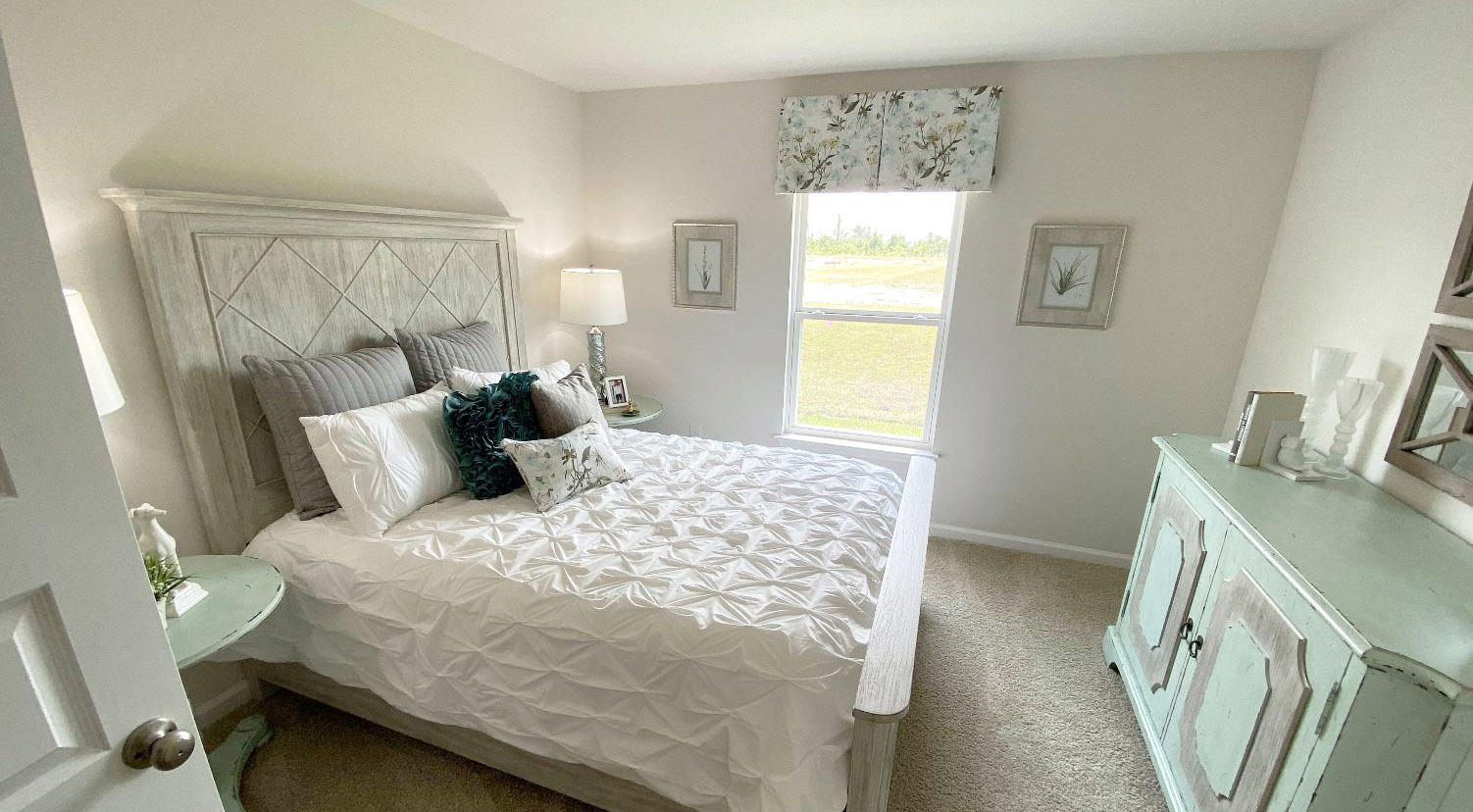 973 Indian Woman Road Santa Rosa Beach, FL 32459 - Photo 6 of 23 a bedroom with a bed and a window