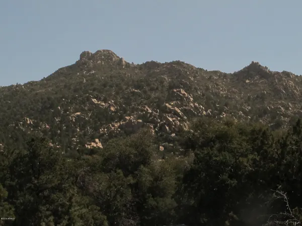 a view of mountain view with mountains in the background