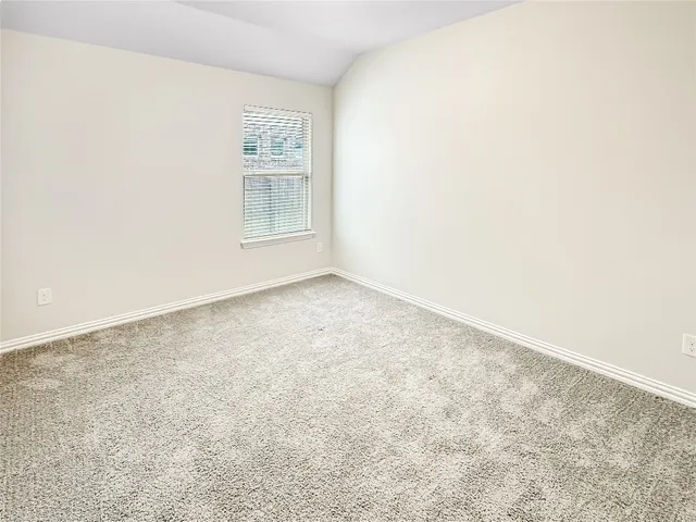 an empty room with a workbench