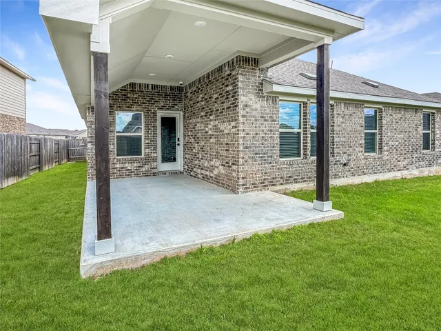 a view of a porch with a yard