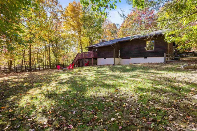 a view of a playground with basketball court