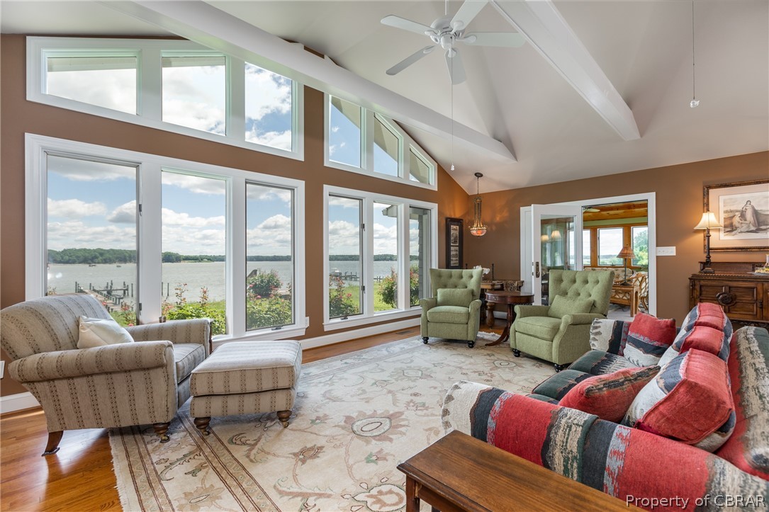 901 Oak Hill Road Lancaster, VA 22503 - Photo 13 of 49 a living room with furniture and floor to ceiling windows