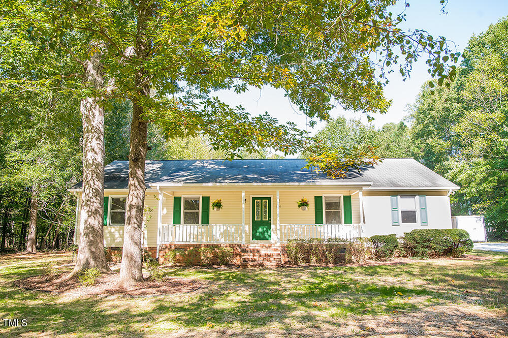850 Lewis Winstead Lp Road Roxboro, NC 27574 - Photo 1 of 72 a front view of a house with a yard