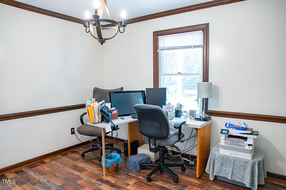 850 Lewis Winstead Lp Road Roxboro, NC 27574 - Photo 23 of 72 a view of a workspace with furniture and a window