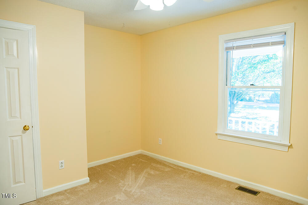 850 Lewis Winstead Lp Road Roxboro, NC 27574 - Photo 38 of 72 a view of an empty room with a window