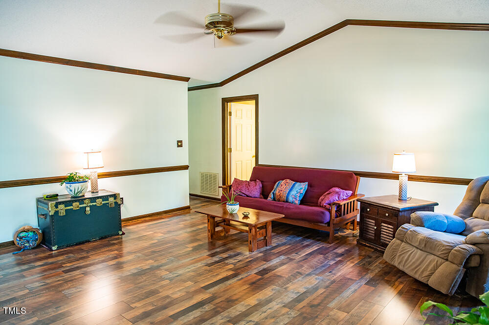 850 Lewis Winstead Lp Road Roxboro, NC 27574 - Photo 4 of 72 a living room with furniture and wooden floor