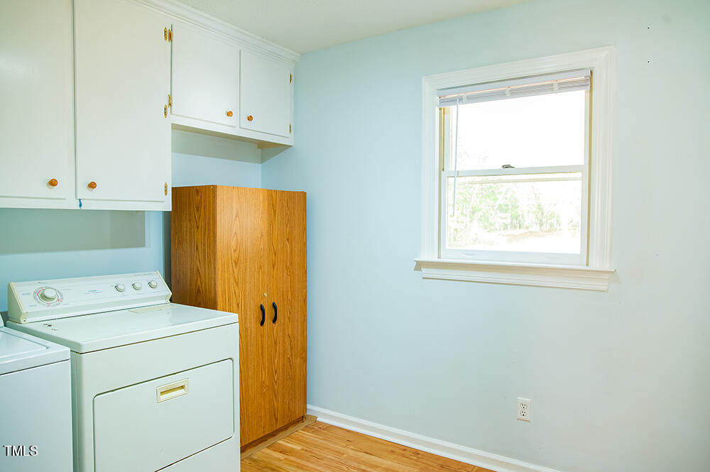 850 Lewis Winstead Lp Road Roxboro, NC 27574 - Photo 46 of 72 a utility room with dryer and washer