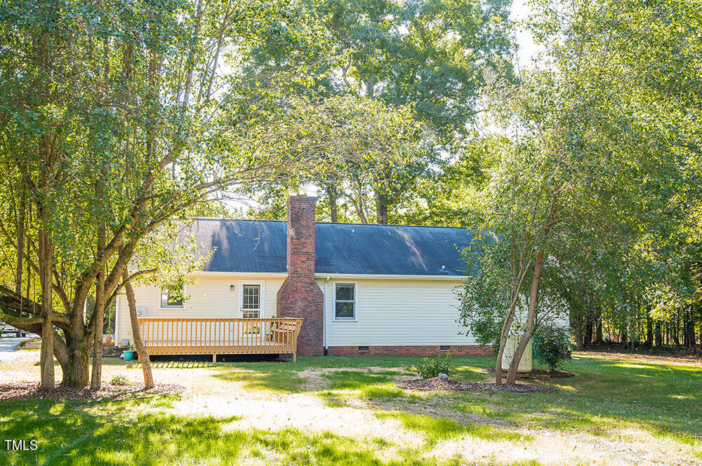 850 Lewis Winstead Lp Road Roxboro, NC 27574 - Photo 58 of 72 a view of a house with backyard and sitting area