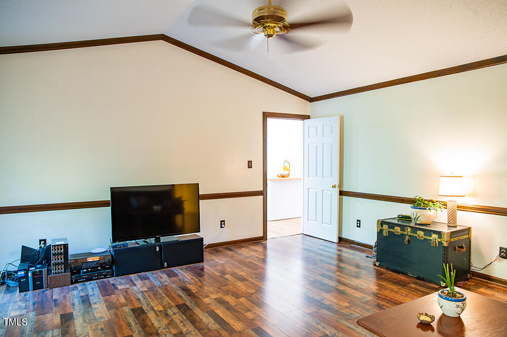 850 Lewis Winstead Lp Road Roxboro, NC 27574 - Photo 6 of 72 a living room with furniture and a flat screen tv
