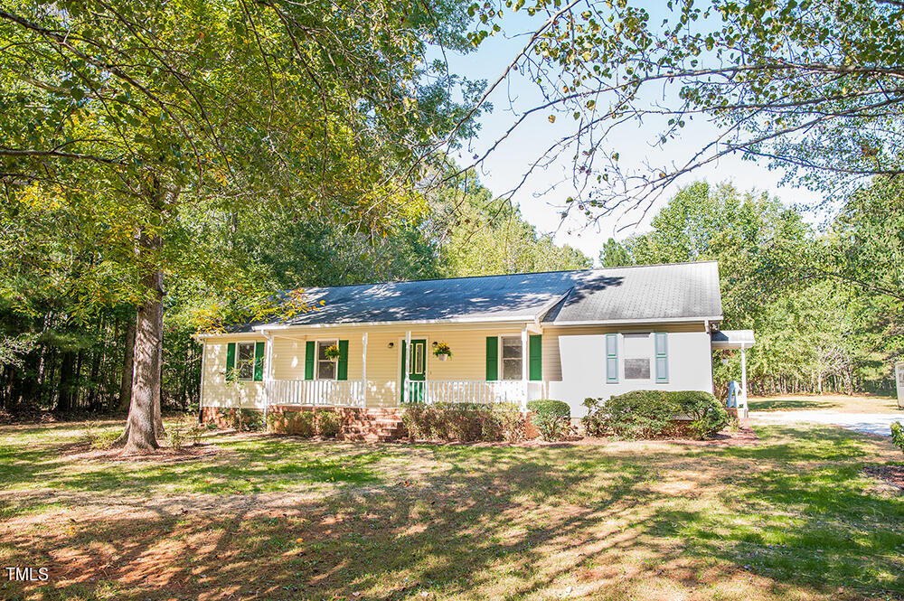 850 Lewis Winstead Lp Road Roxboro, NC 27574 - Photo 65 of 72 front view of a house with a big yard