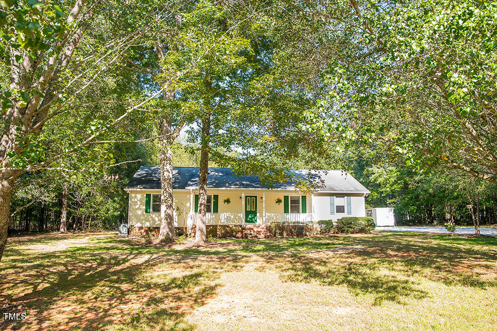 850 Lewis Winstead Lp Road Roxboro, NC 27574 - Photo 67 of 72 a front view of a house with a yard