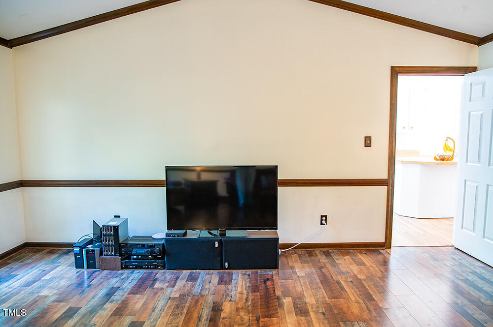 850 Lewis Winstead Lp Road Roxboro, NC 27574 - Photo 7 of 72 a living room with furniture and a flat screen tv