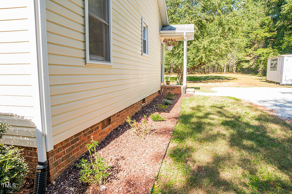 850 Lewis Winstead Lp Road Roxboro, NC 27574 - Photo 71 of 72 a view of a house with a yard
