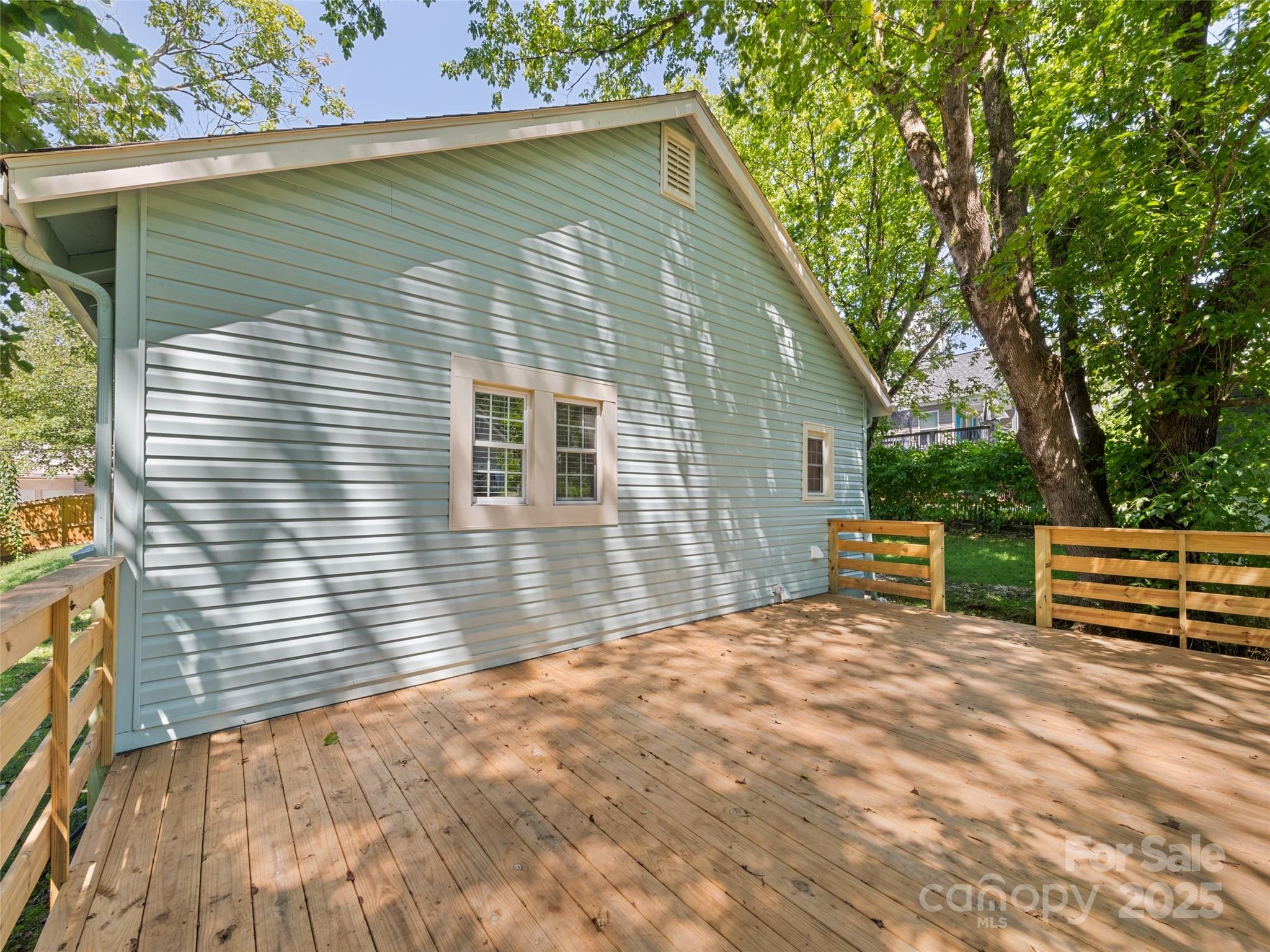 468 Deaverview Road Asheville, NC 28806 - Photo 5 of 26 a view of house with backyard and deck