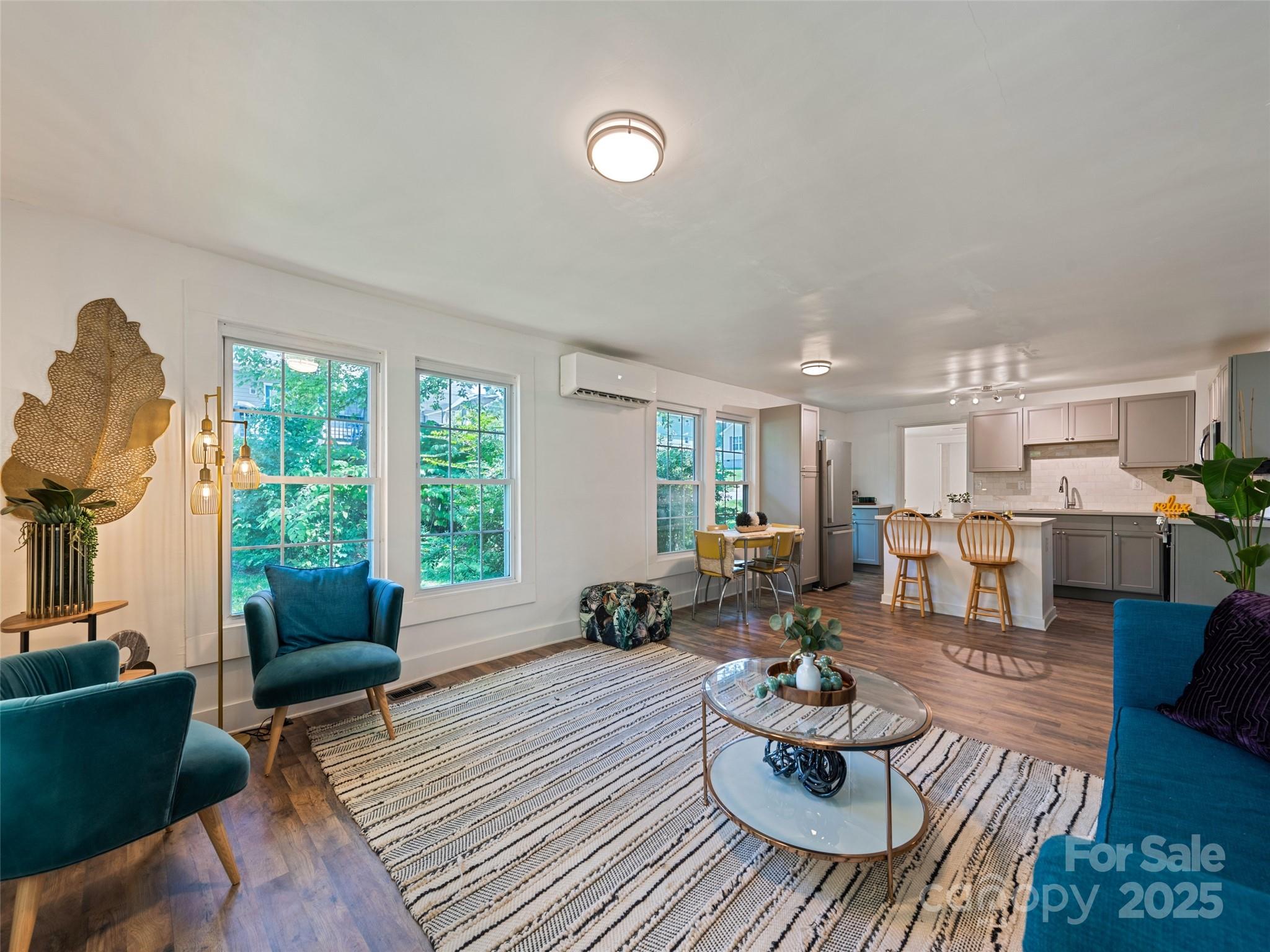 468 Deaverview Road Asheville, NC 28806 - Photo 8 of 26 a living room with furniture fireplace and a large window