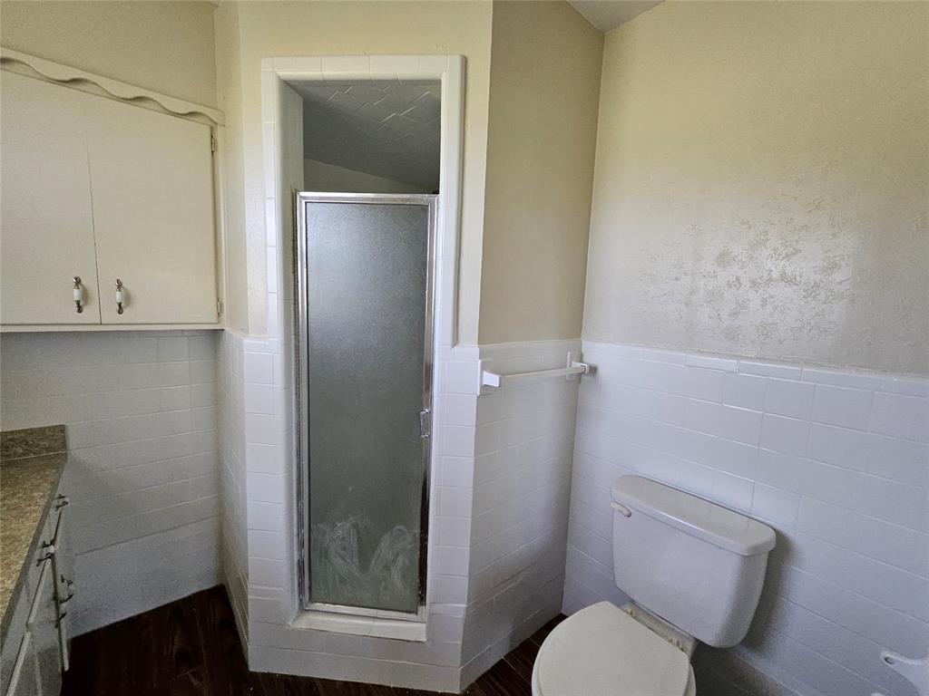 2100 Farm To Market 4 Cleburne, TX 76031 - Photo 13 of 16 a bathroom with a toilet and a shower