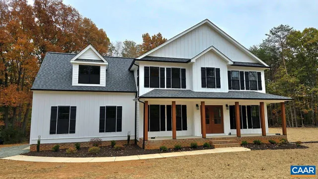 a front view of a house with yard
