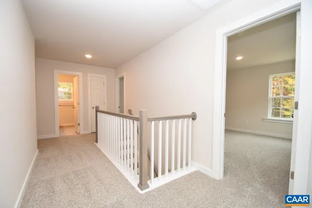 a view of a hallway with closet area