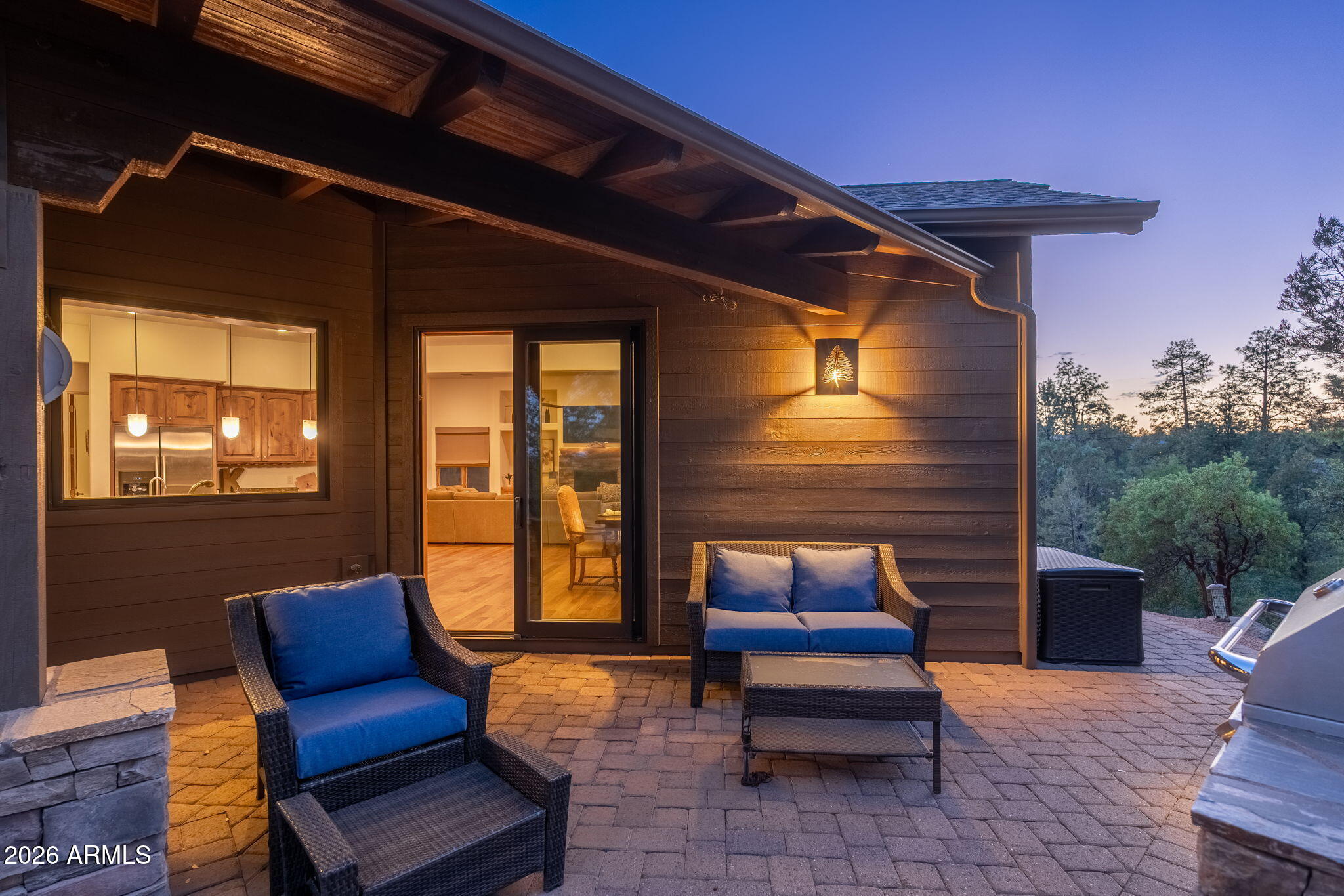 2208 East Filaree Circle Payson, AZ 85541 - Photo 43 of 60 a outdoor sitting area with a couch and wooden floor