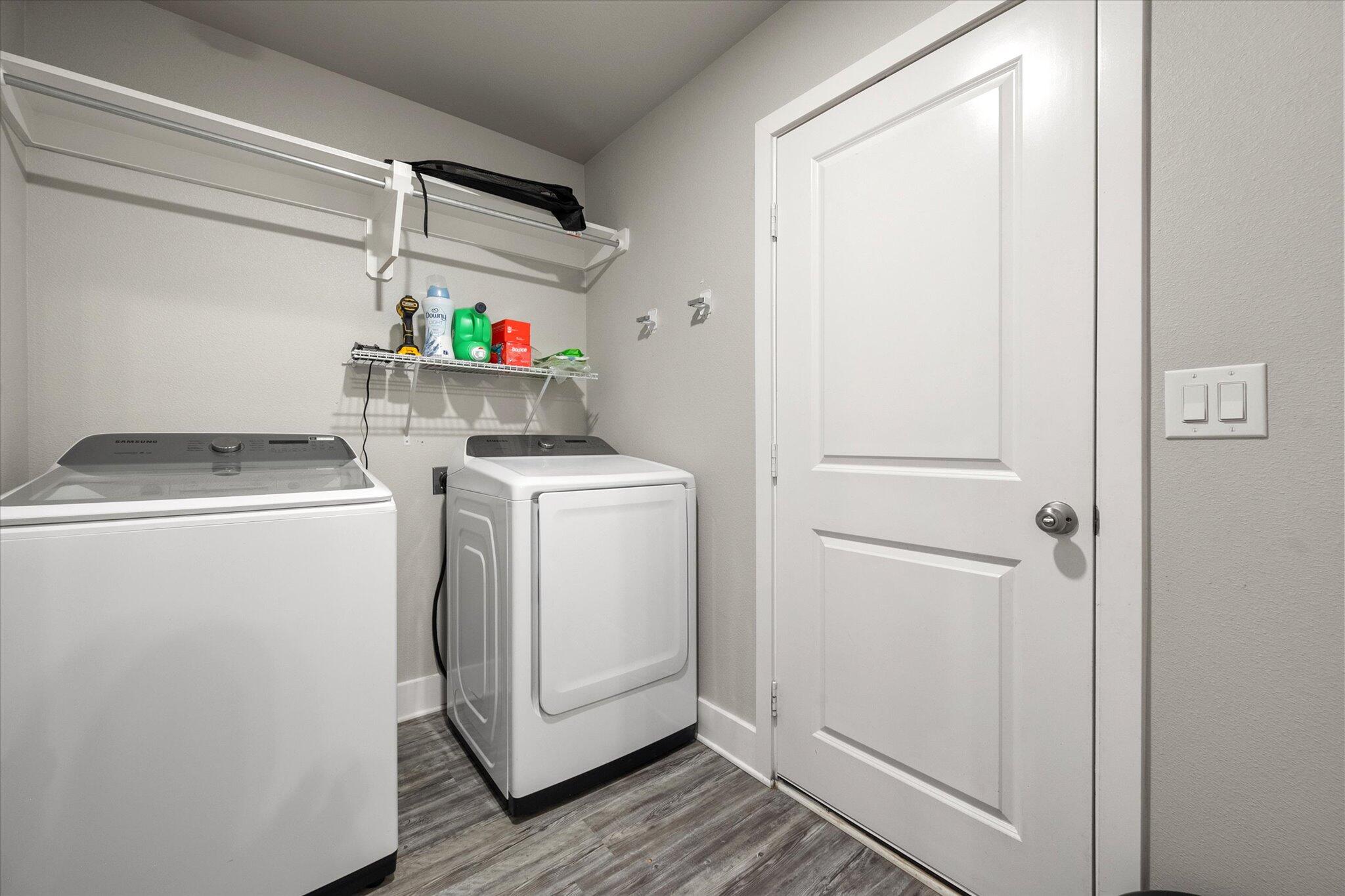7449 31st Street Lubbock, TX 79407 - Photo 20 of 23 a utility room with dryer and washer